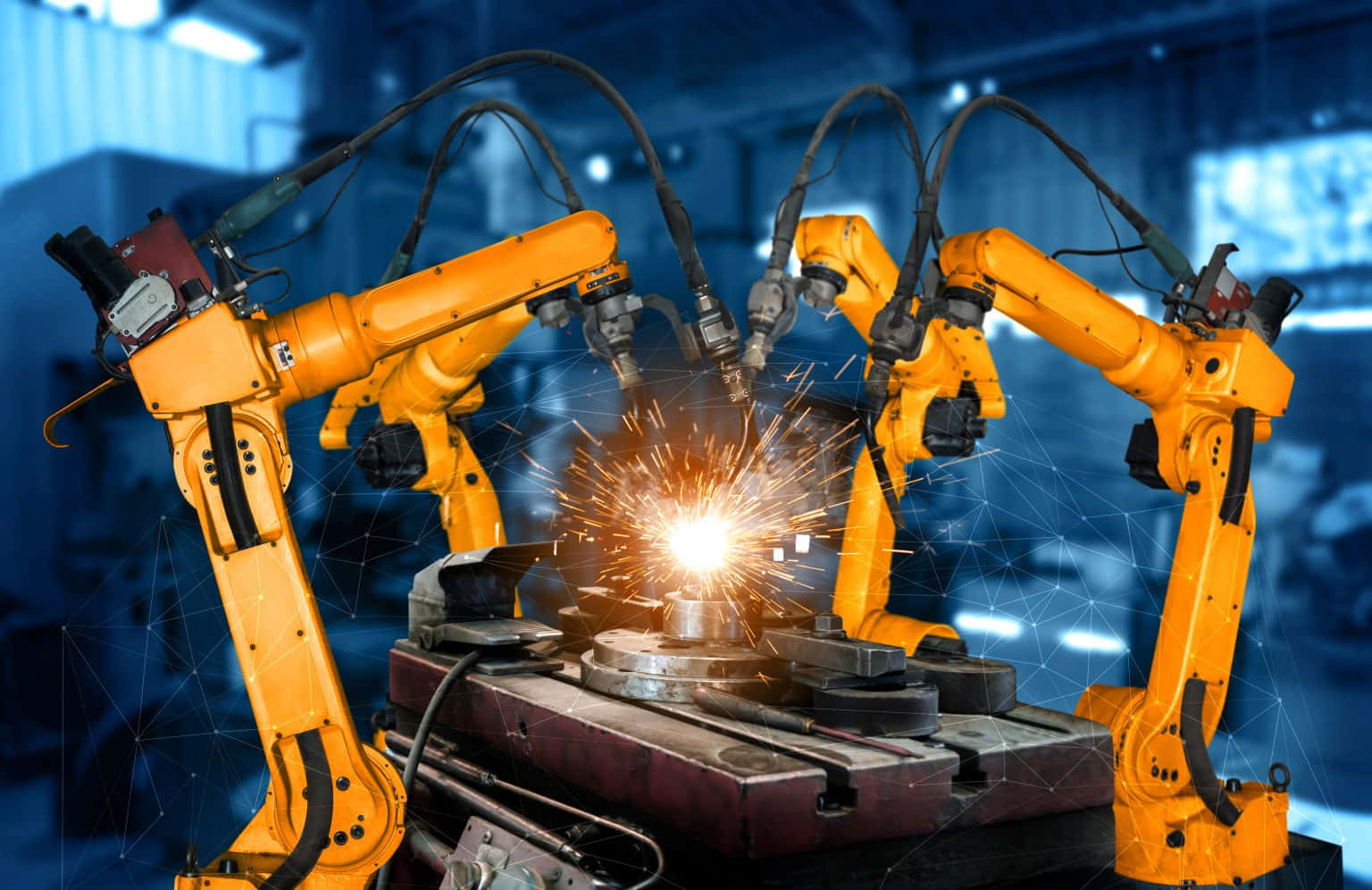 Automated robots working in unison in a precision manufacturing facility Wallpaper