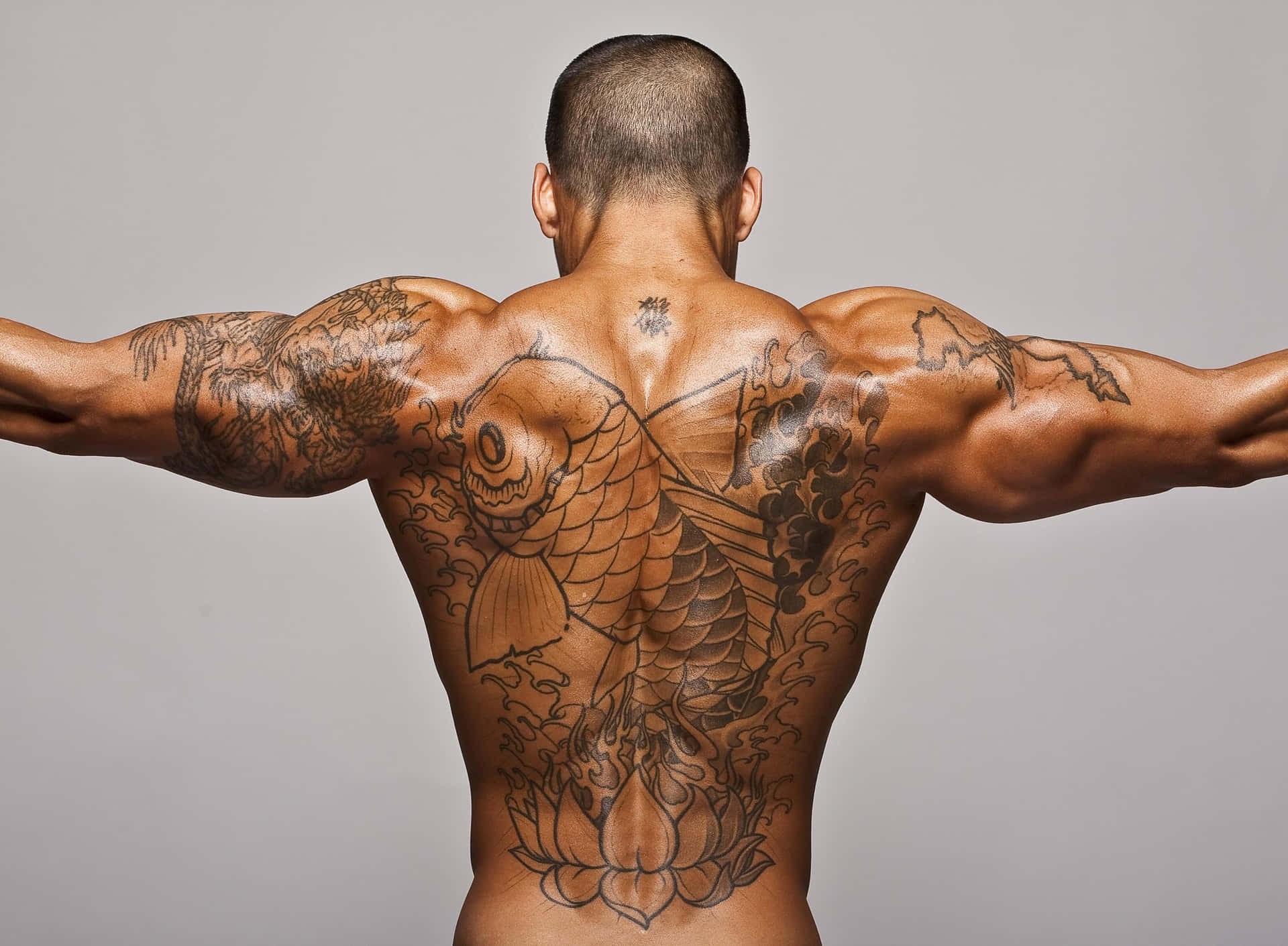 Manwith Back Tattoos Wallpaper