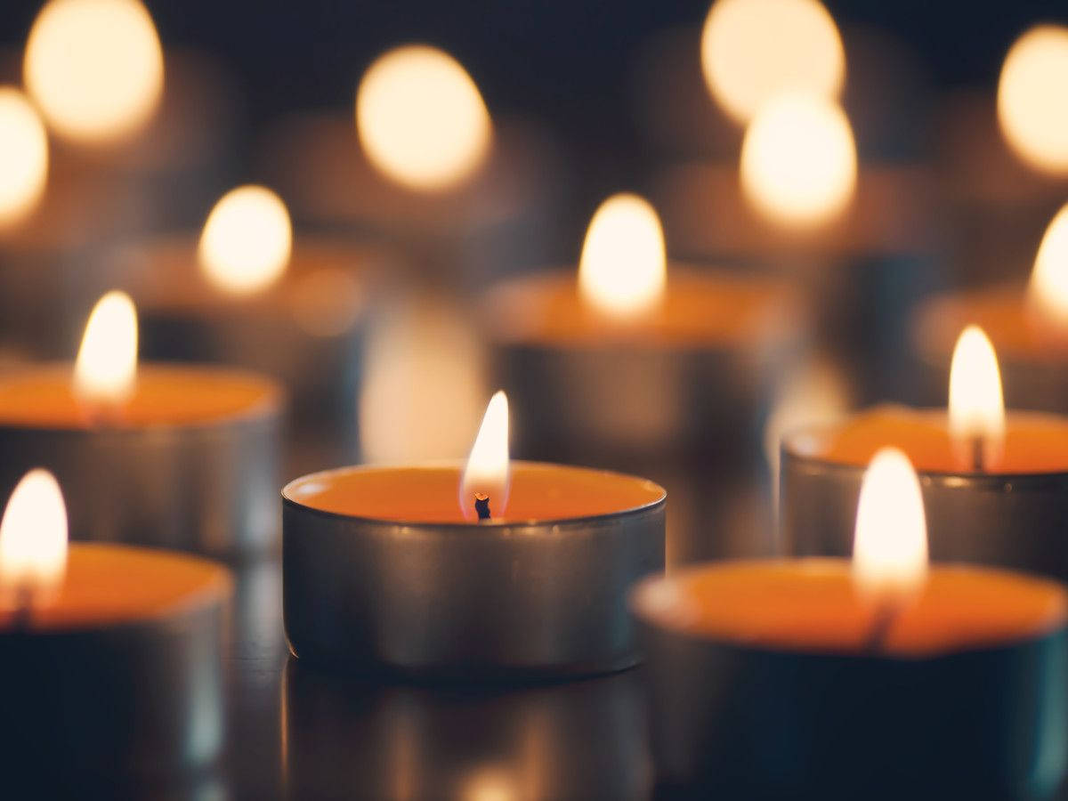 Many Lit Candles Condolence