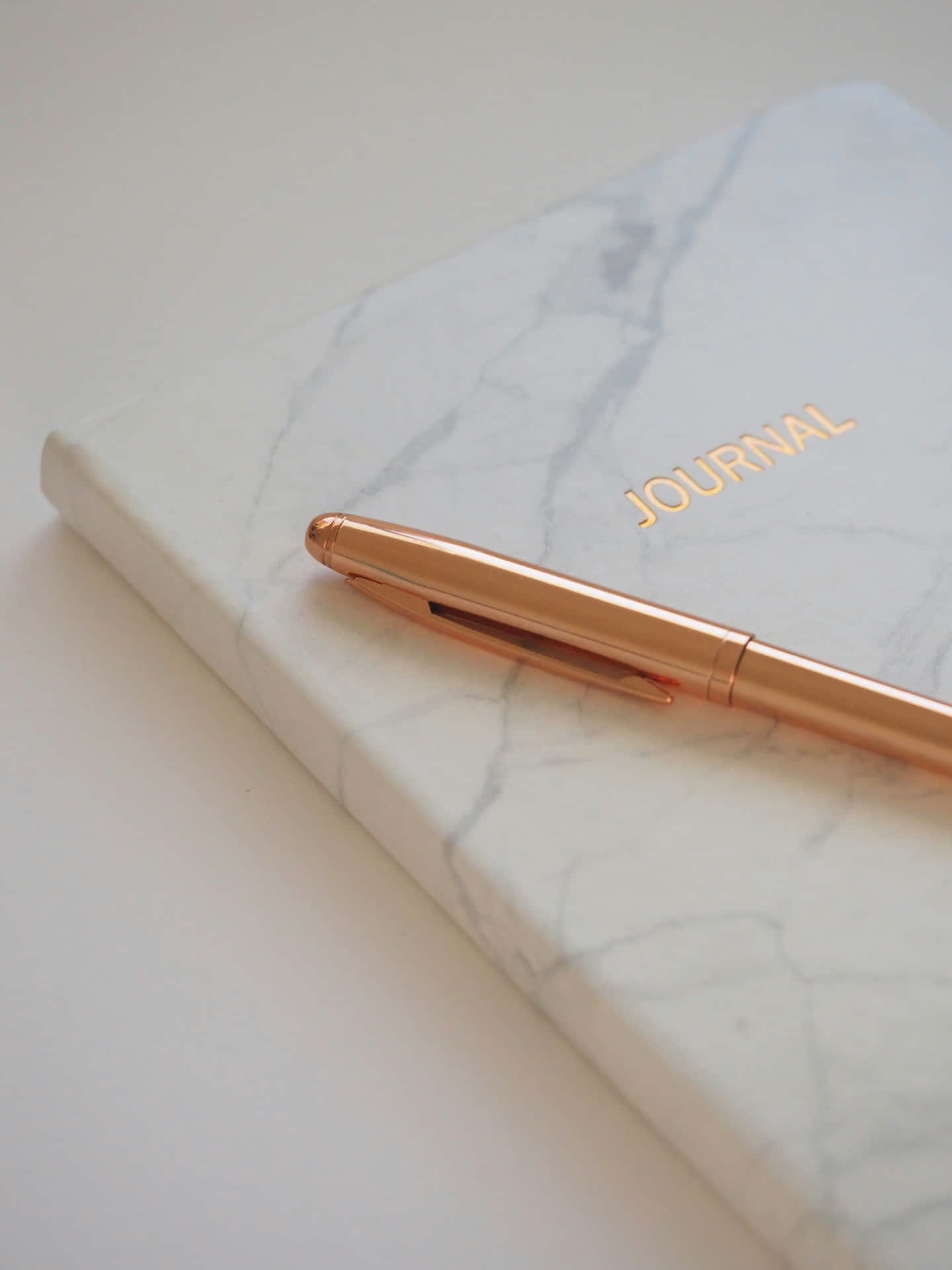 Marble Journalwith Rose Gold Pen Wallpaper
