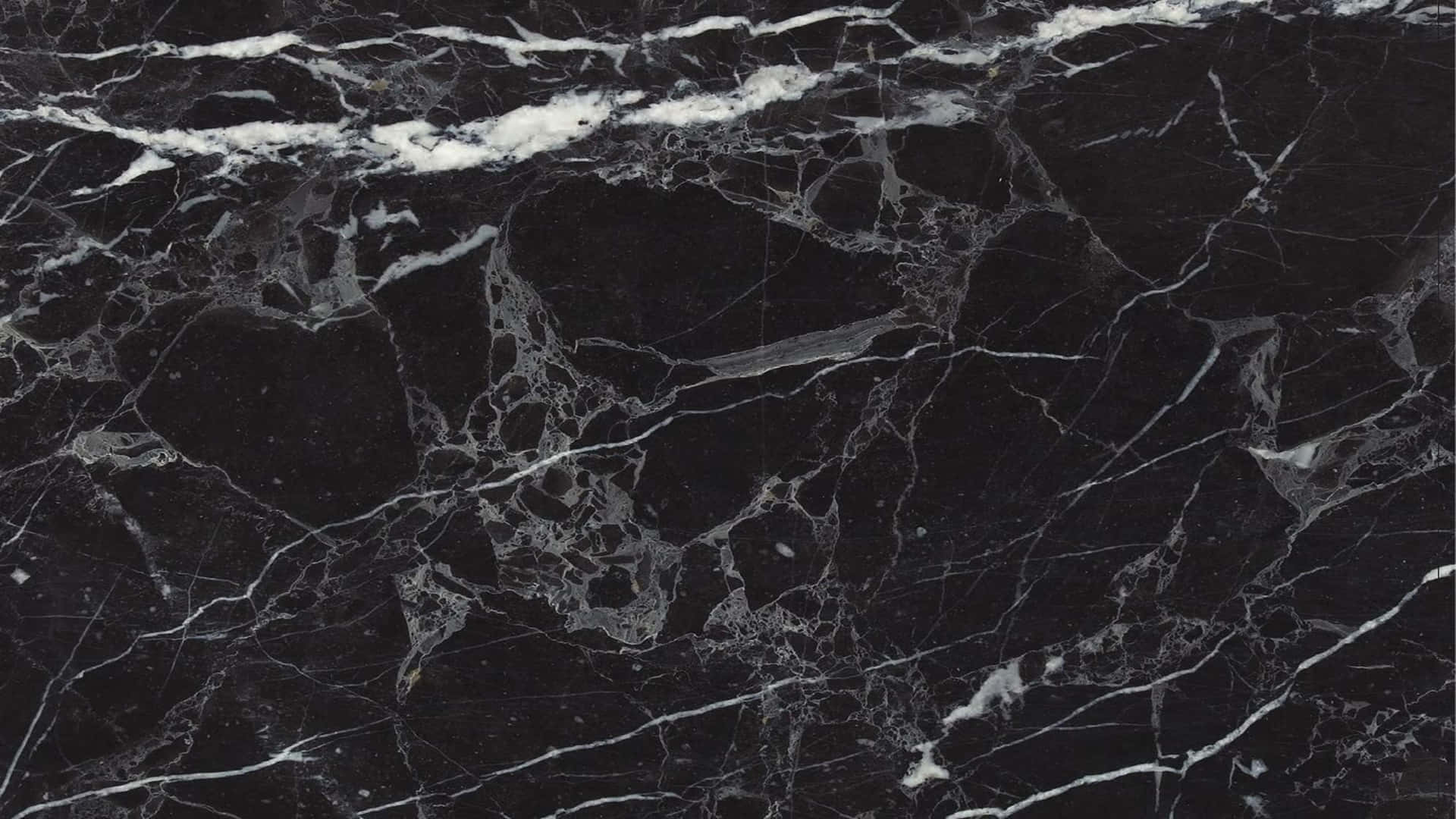 Enhance Your Computing Experience with a Stylish Marble Macbook Wallpaper