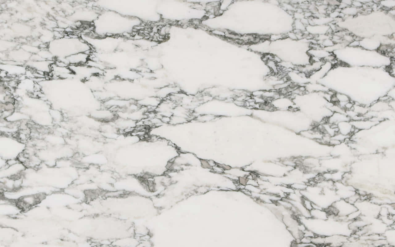 Få et stilrent og stilfuldt look med dette tidløse marmor Macbook tapet. Wallpaper