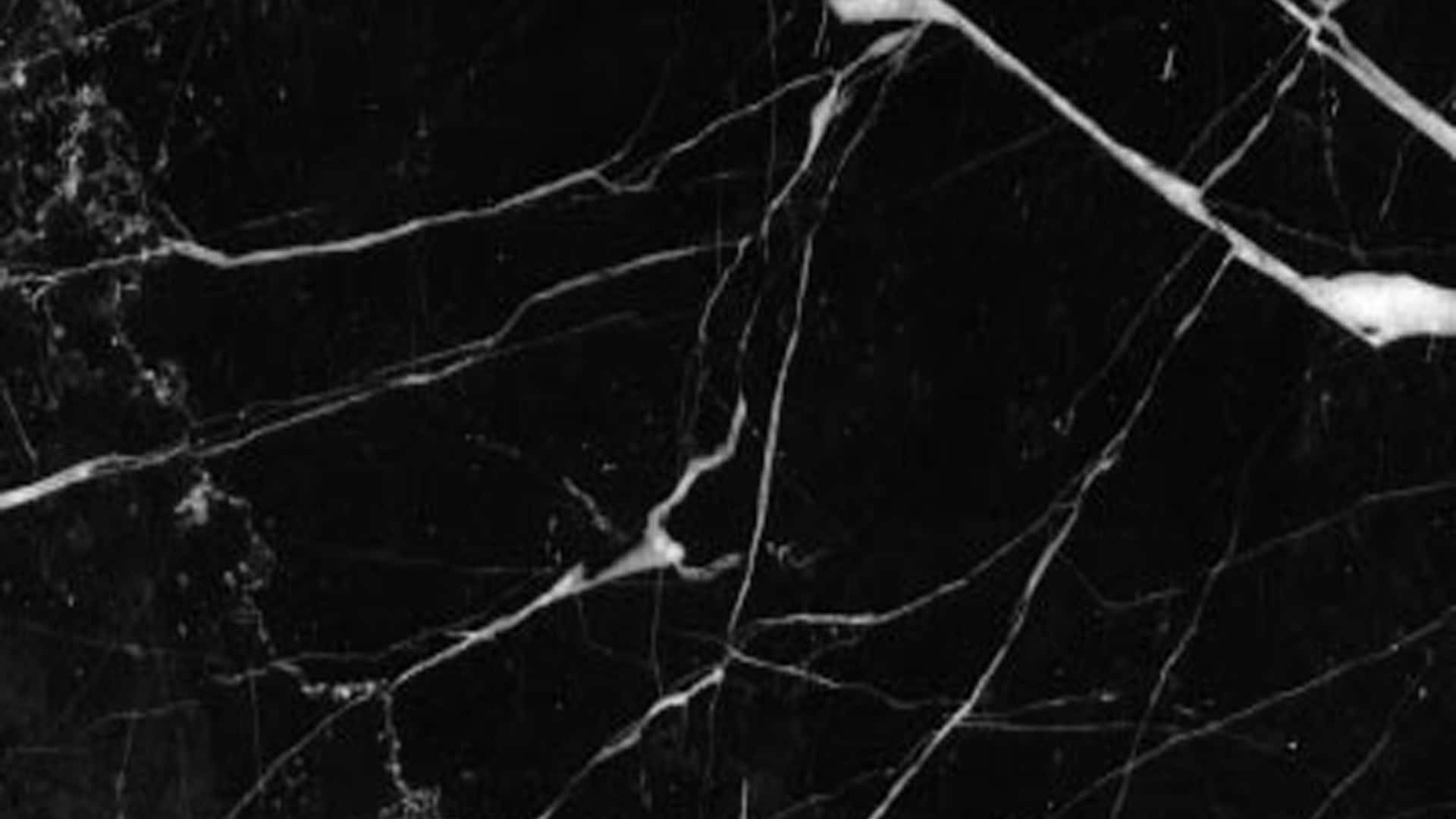 Elevate Your Creative Process with this Luxurious Marble Macbook Wallpaper