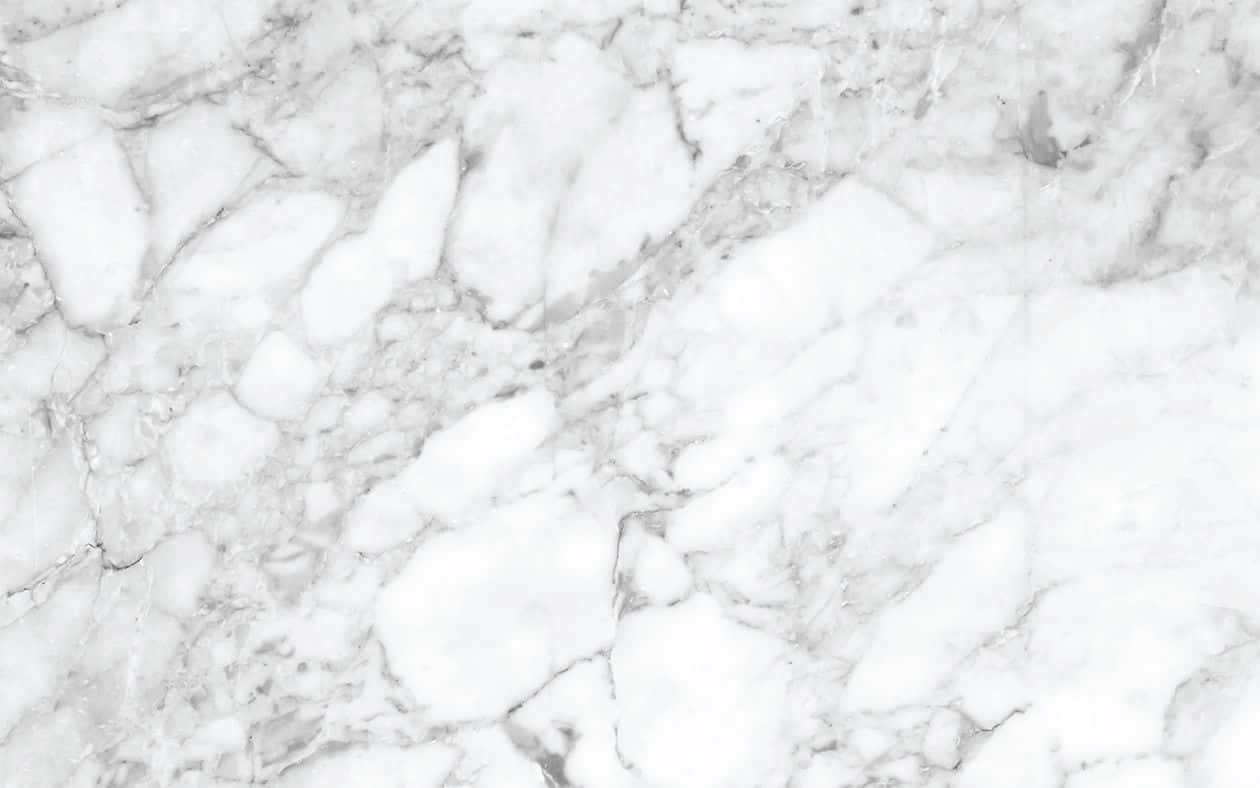 A Close Up Of A White Marble Wall Wallpaper