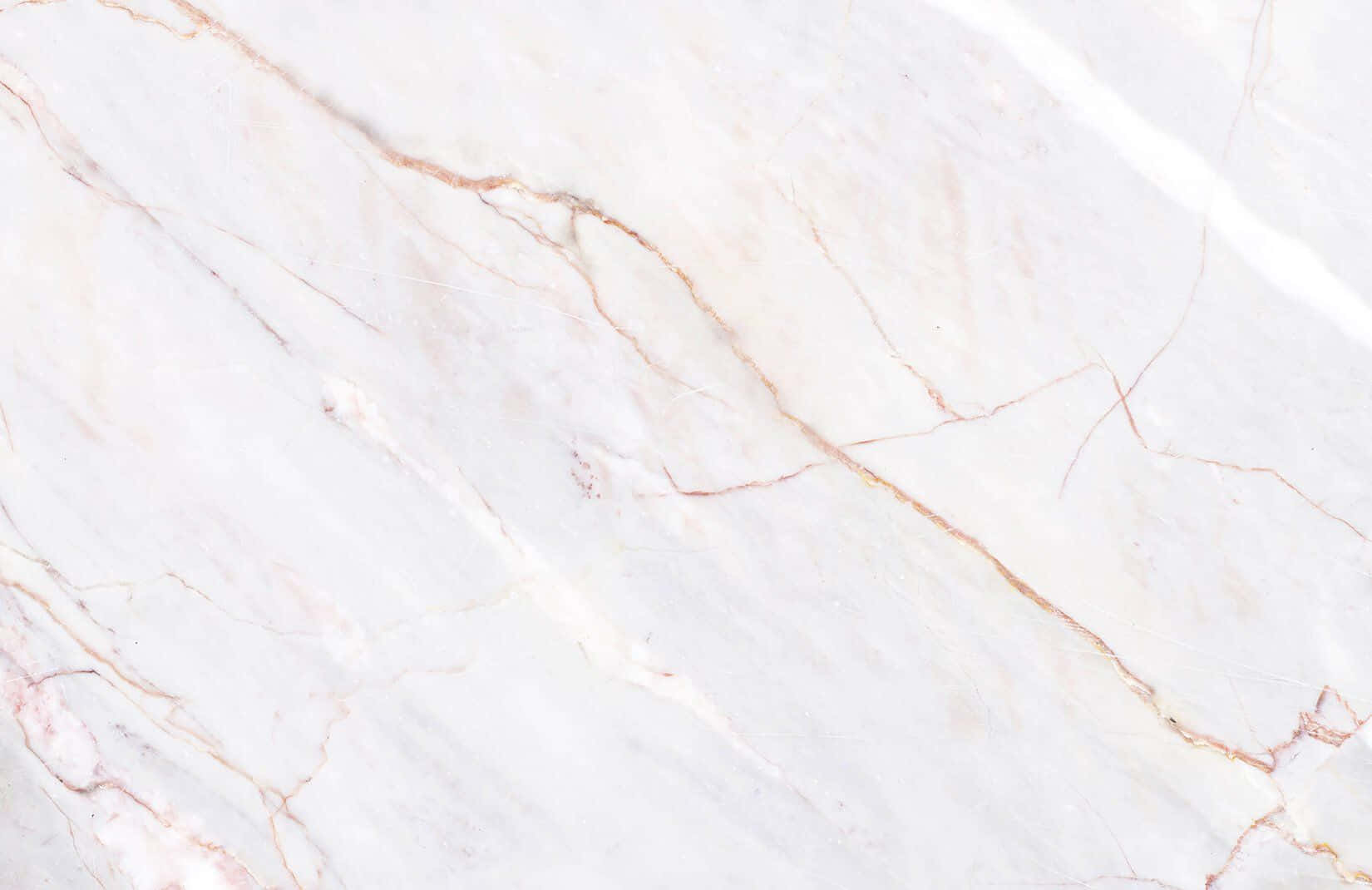 A White Marble Background With A Pink Color