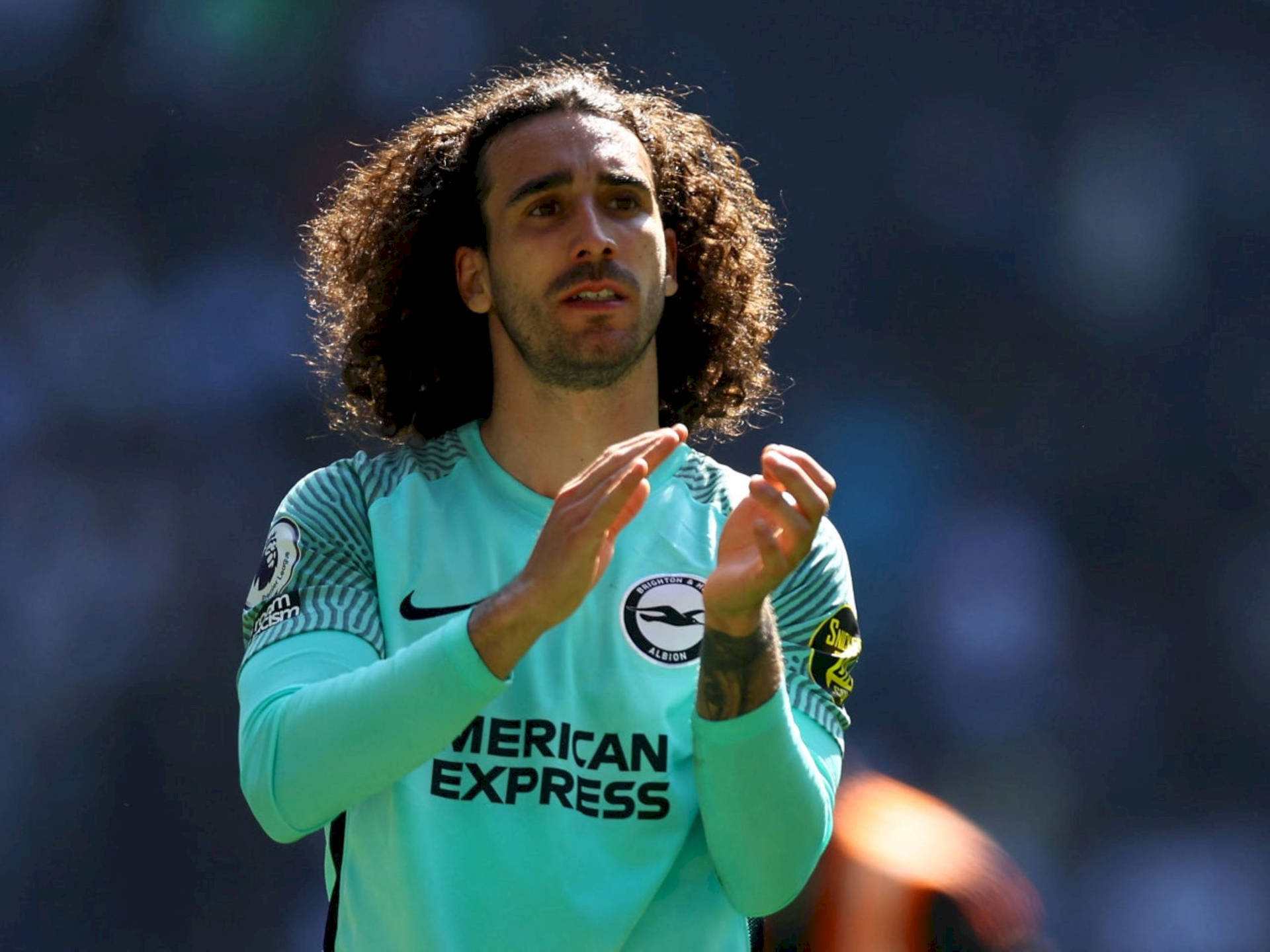 Marc Cucurella Clapping Teal Background