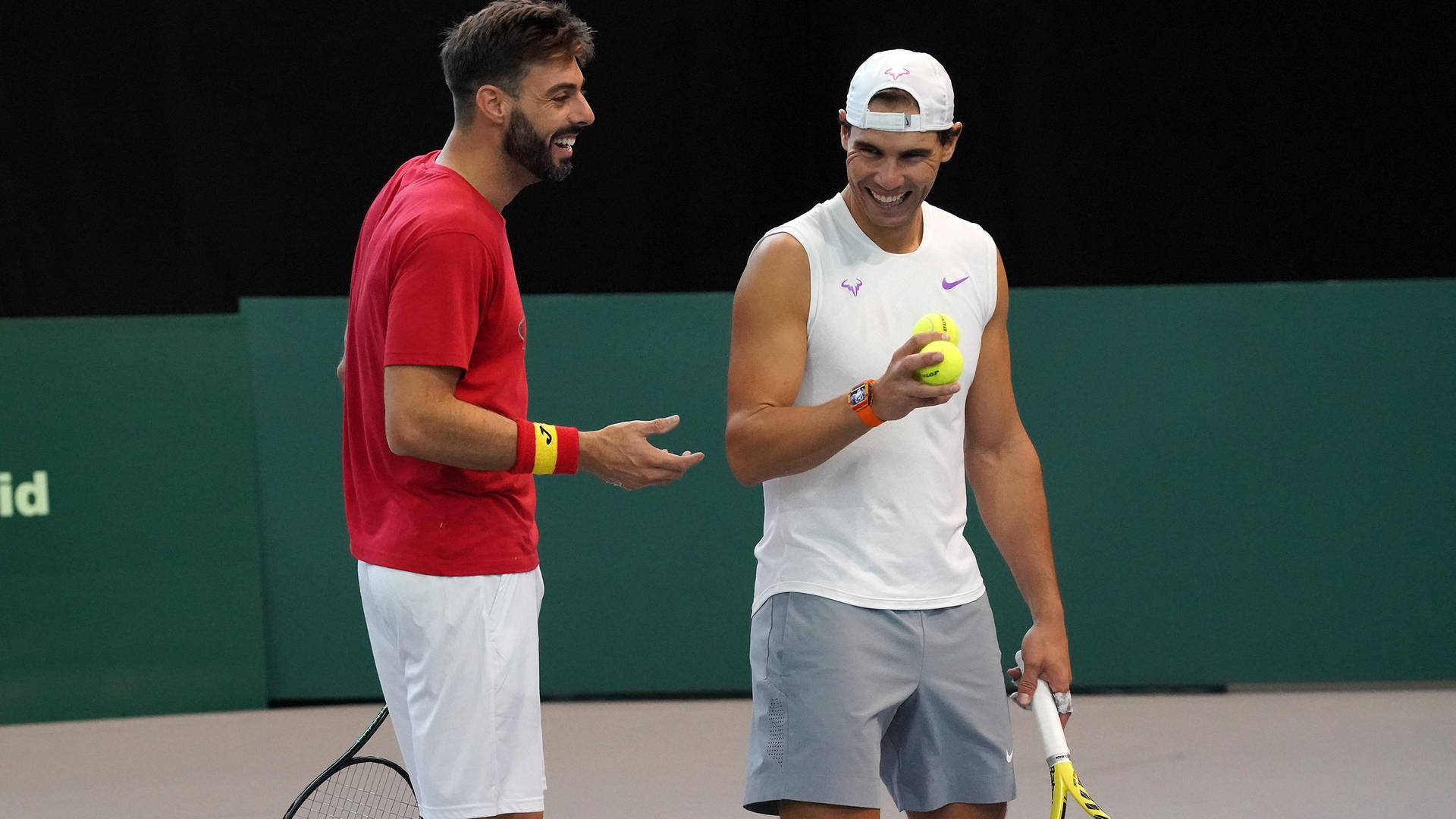 Marcel Granollers Laughing With Rafael Nadal Wallpaper
