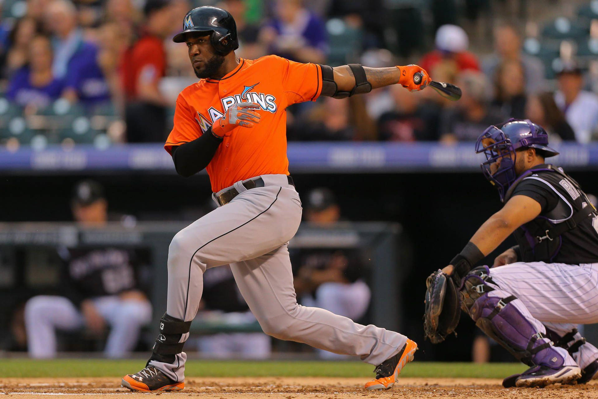 Download Marcell Ozuna With Orange Jersey Wallpaper