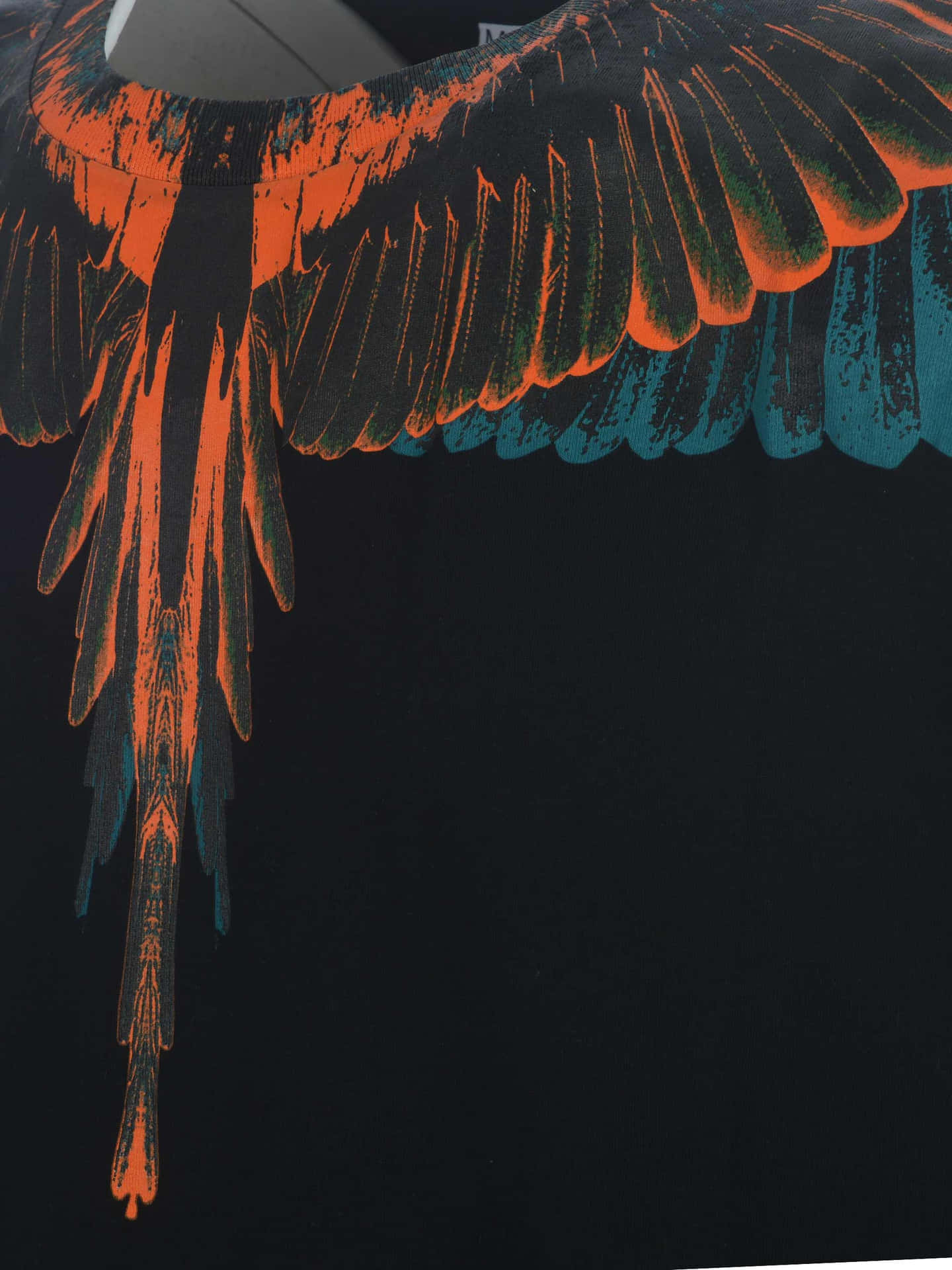 Marcelo Burlon Orange Bluish Green Wings. (note: The Name And Design Are Not Translatable Into Swedish, So They Remain In English.) Wallpaper