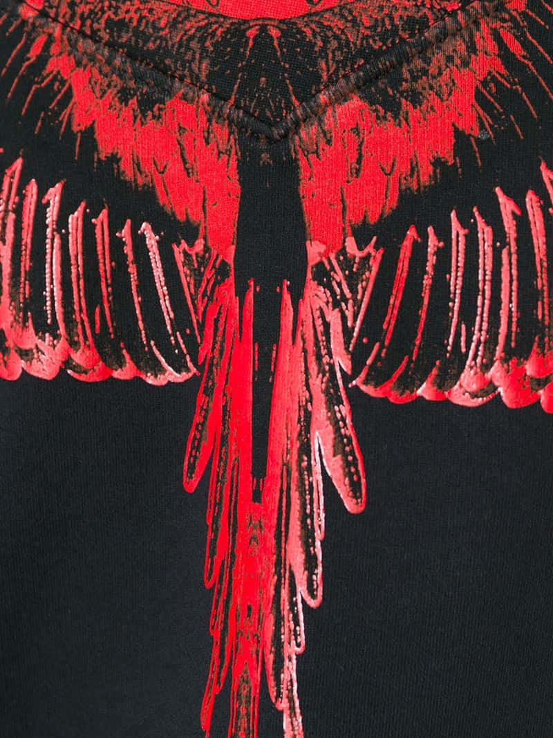 Vibrant Red Wings Design by Marcelo Burlon Wallpaper