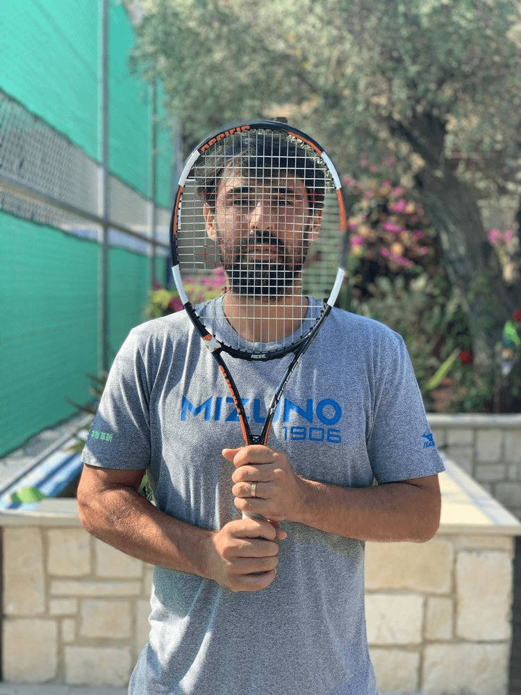 Marcos Baghdatis Behind Racket Wallpaper