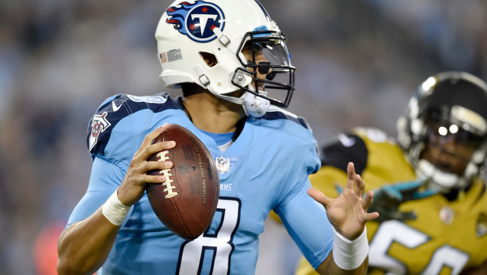 Marcus Mariota Tennessee Titans Quarterback Action Wallpaper