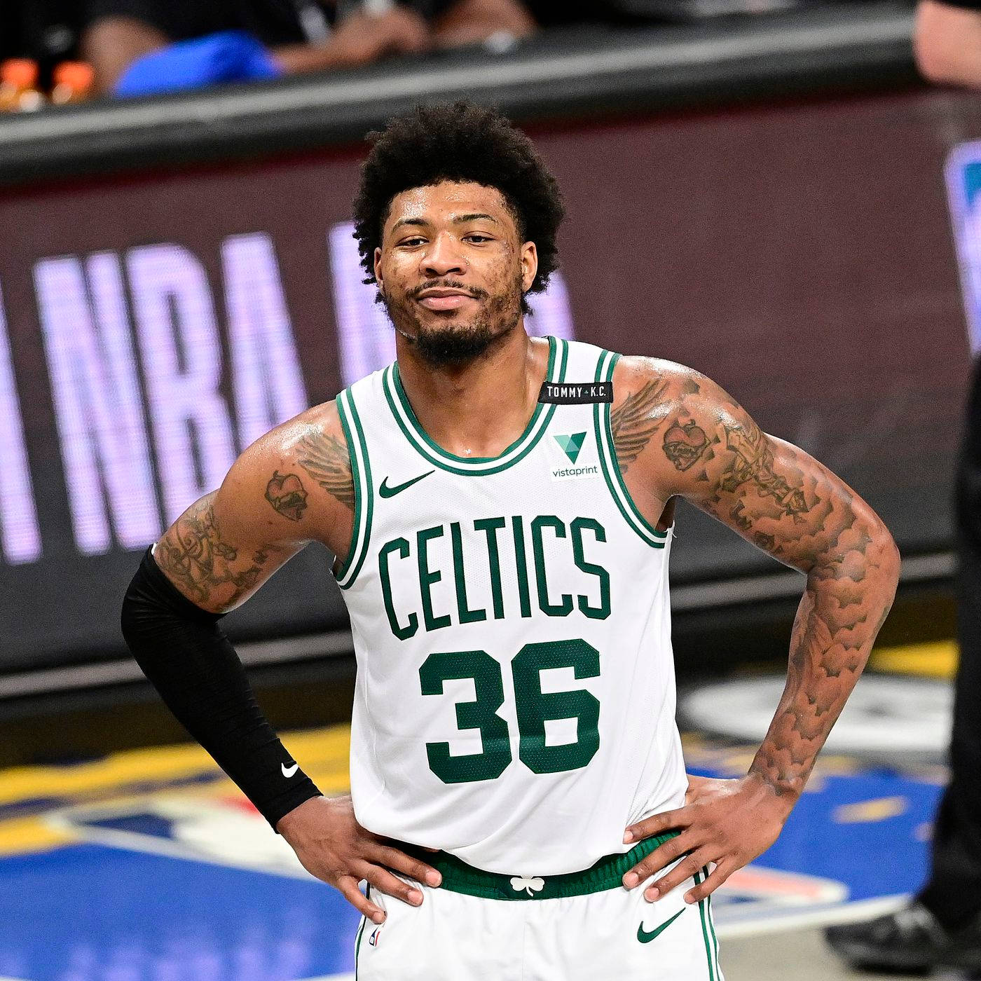 Marcus Smart Glances To Other Members Wallpaper
