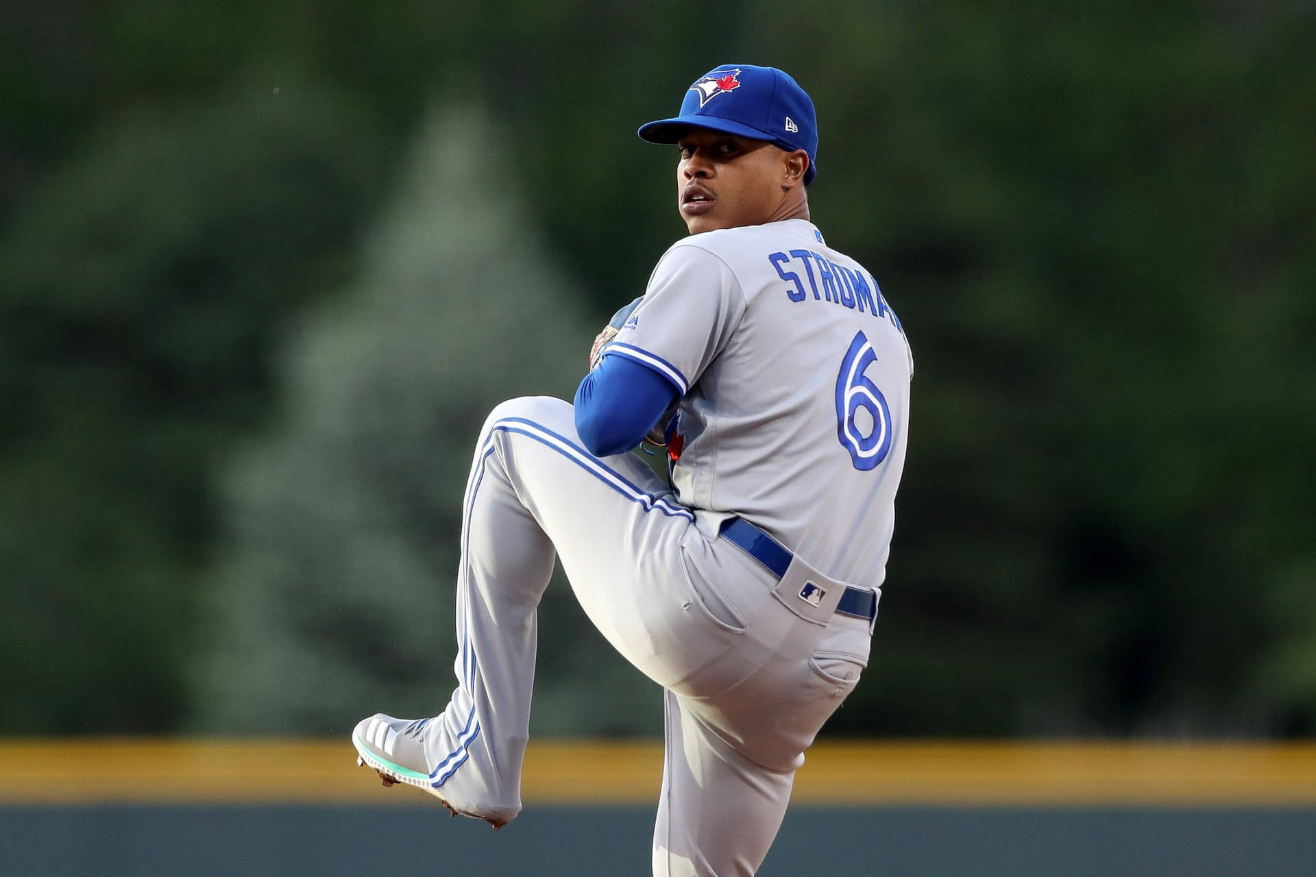 Download Marcus Stroman With Leg Up Wallpaper