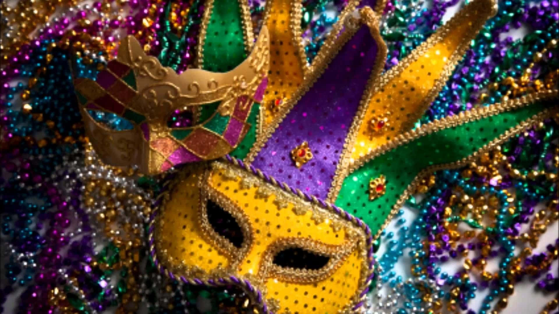 Maske og perler til Mardi Gras på et bord Wallpaper