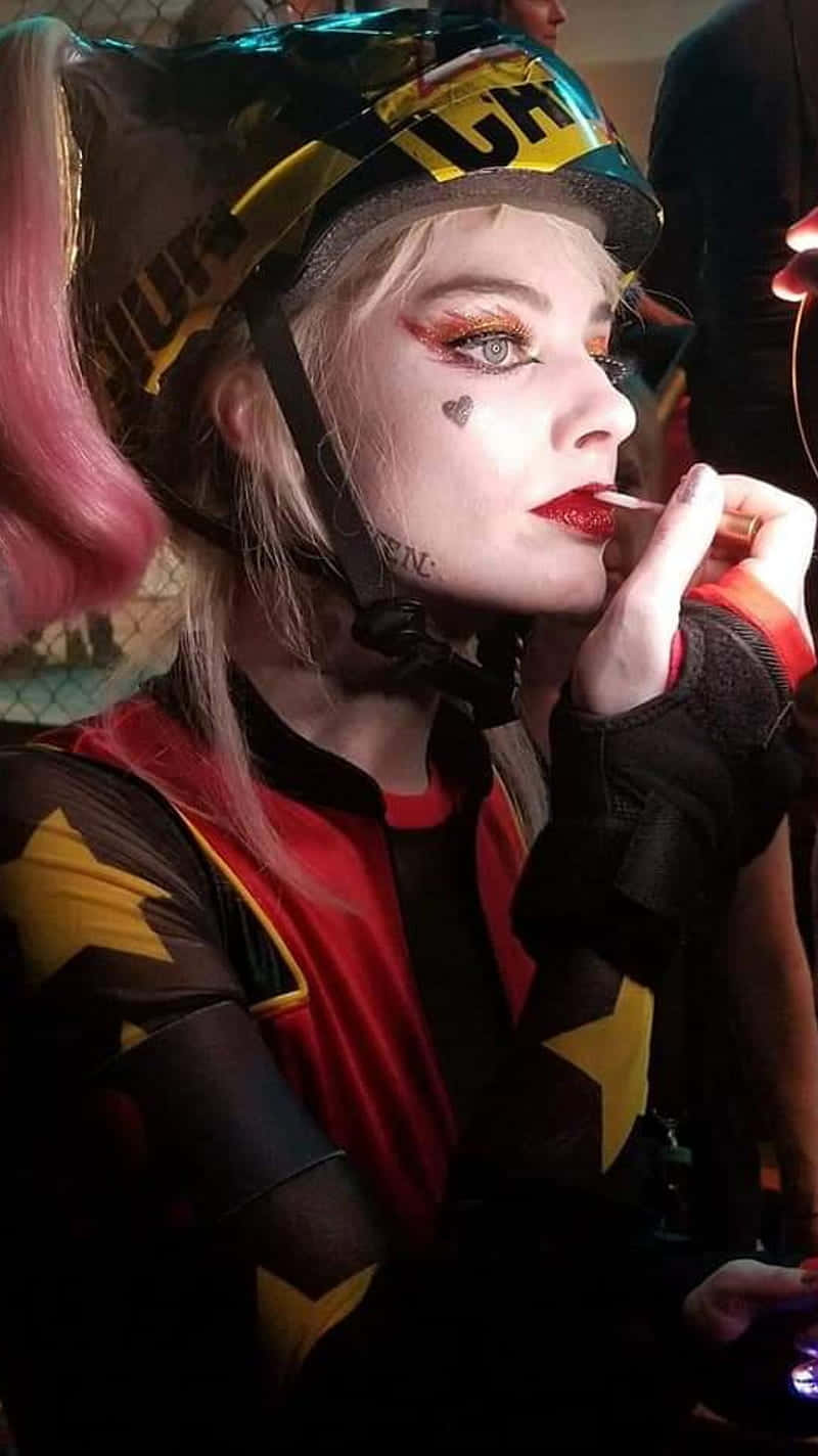 Margotrobbie Als Die Ikonische Harley Quinn Wallpaper