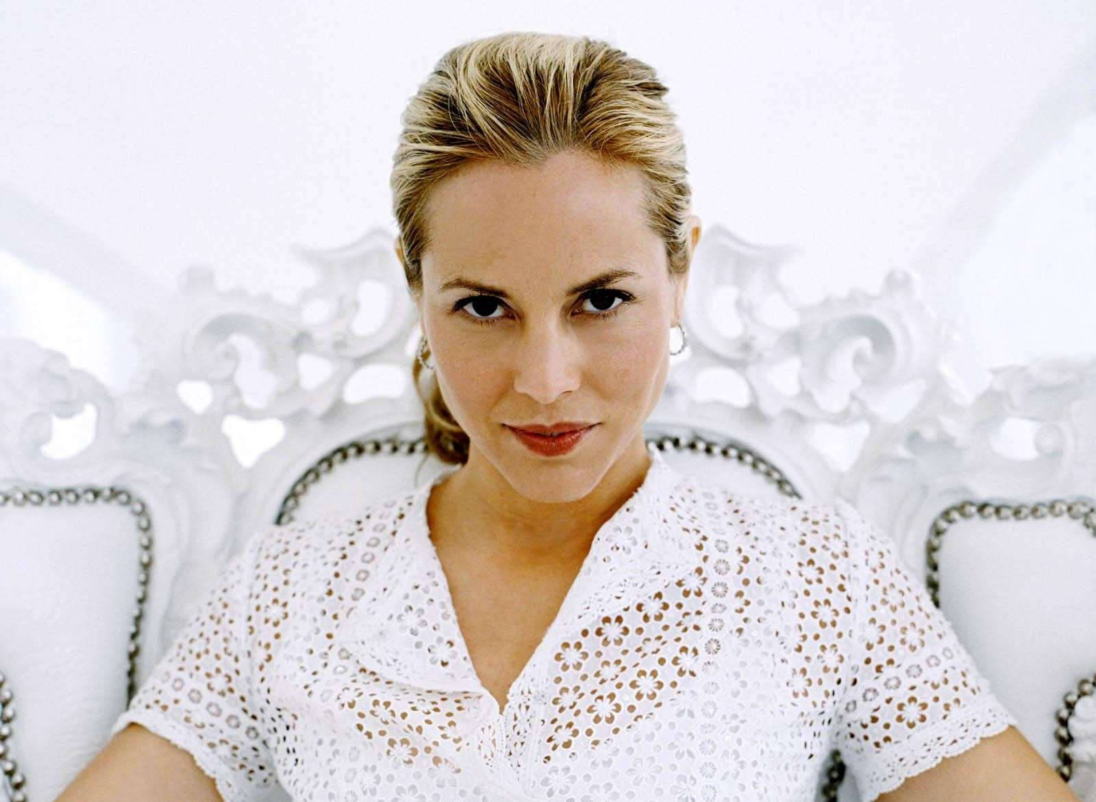 "Maria Bello Exudes Elegance in a Simple White Dress" Wallpaper