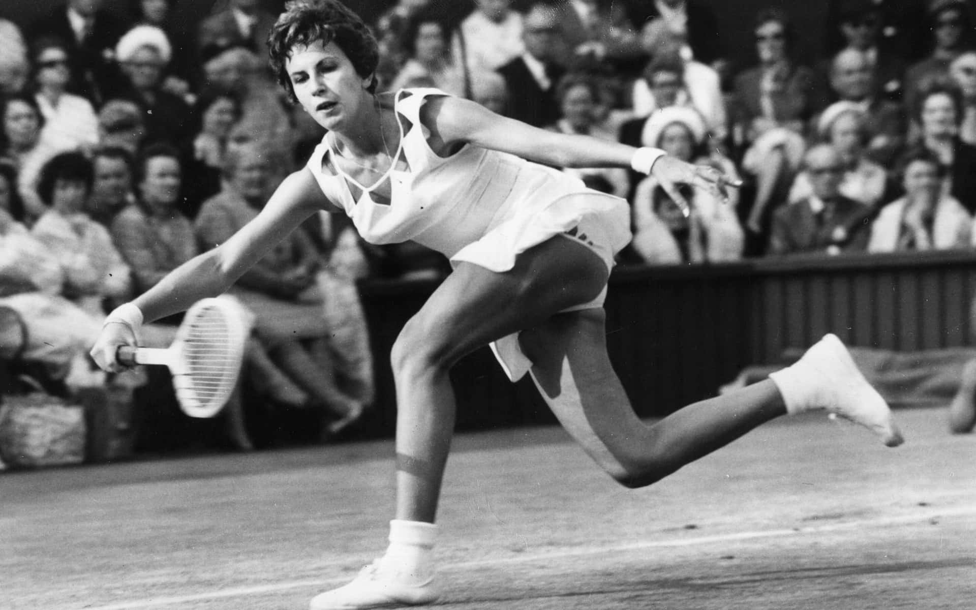 Maria Bueno Demonstrates Exceptional Tennis Skill in Action Wallpaper