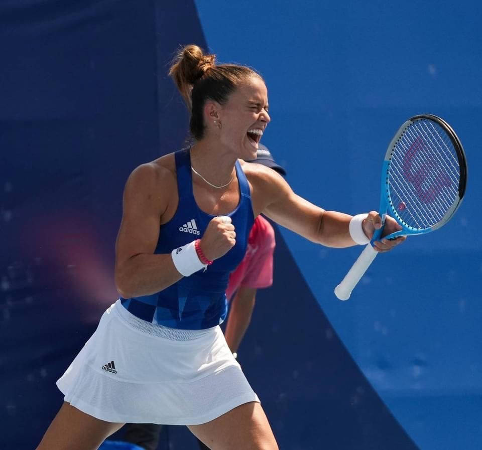 Maria Sakkari Celebrating Victory in Tennis Match Wallpaper