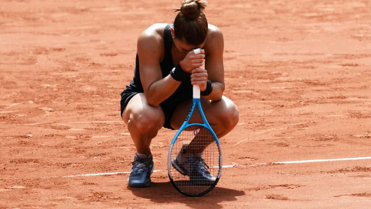 Maria Sakkari in action during a tennis match. Wallpaper
