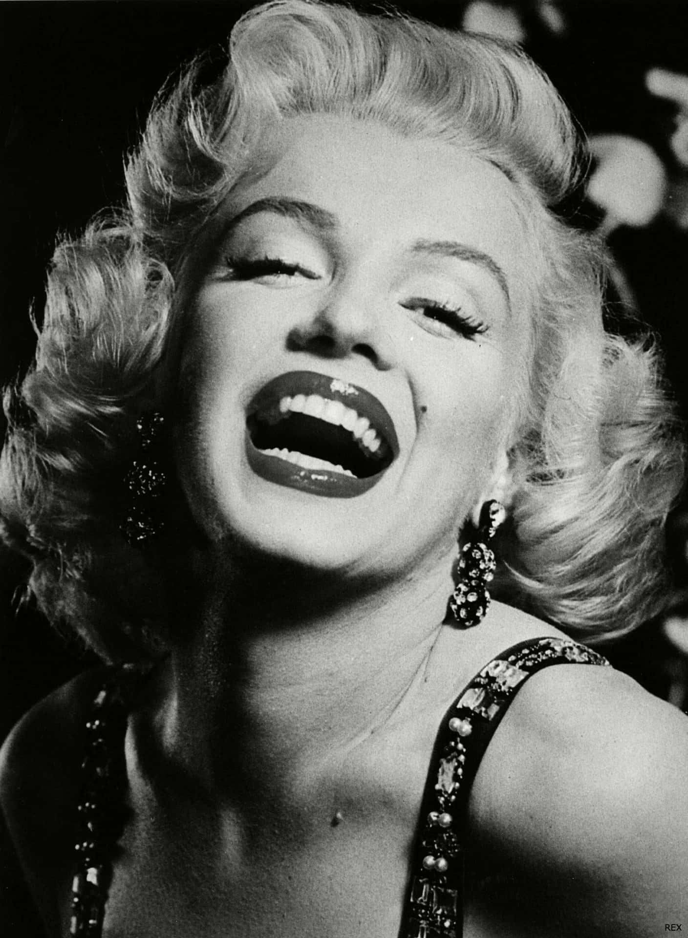 "Here I am with my trusty Marilyn Monroe Iphone" Wallpaper