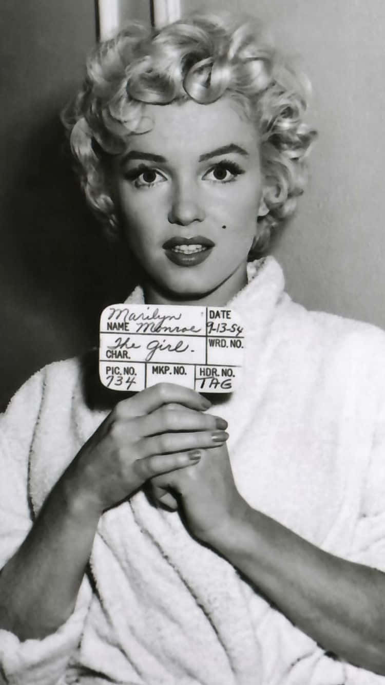 Fåglamourös Stil Med Marilyn Monroe På Din Iphone. Wallpaper