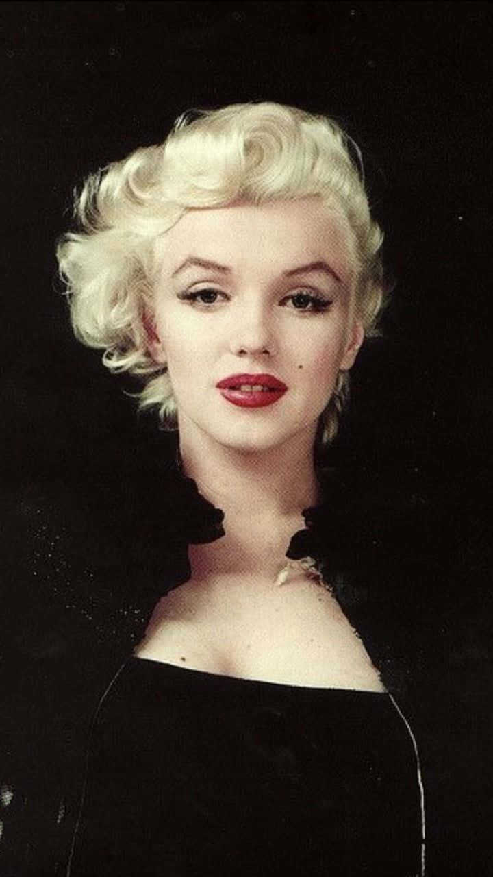 Känndig Självsäker Med Marilyn Monroe Som Din Mobiltelefon Tapet. Wallpaper