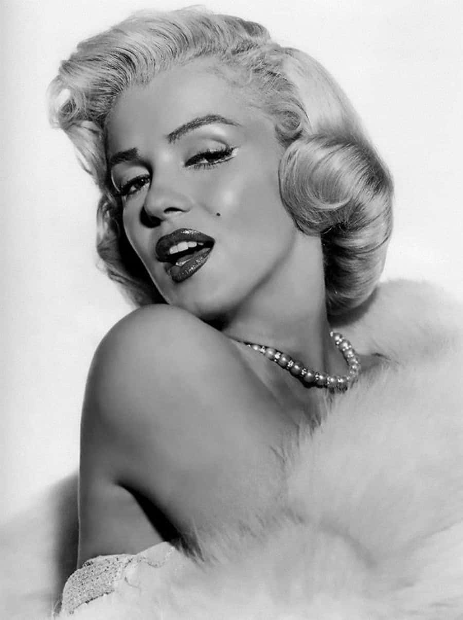 Iconischeschönheit, Leben Und Vermächtnis Von Marilyn Monroe