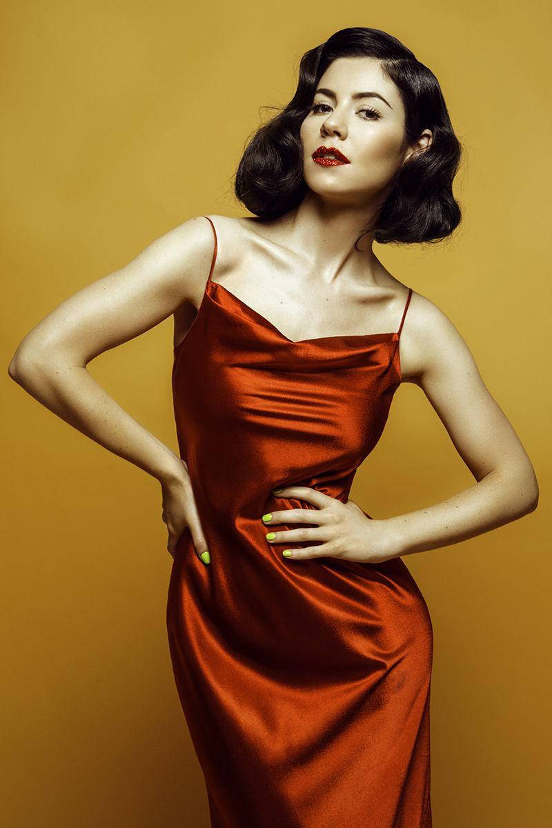 Marina And The Diamonds Red Background