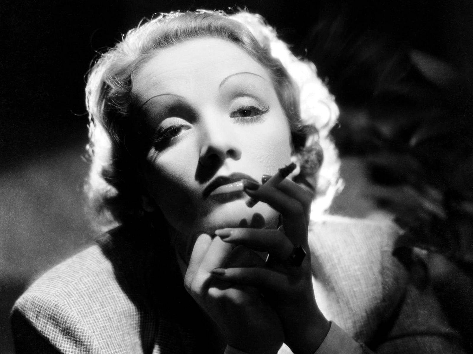 Marlene Dietrich Cigarette In Hand Wallpaper