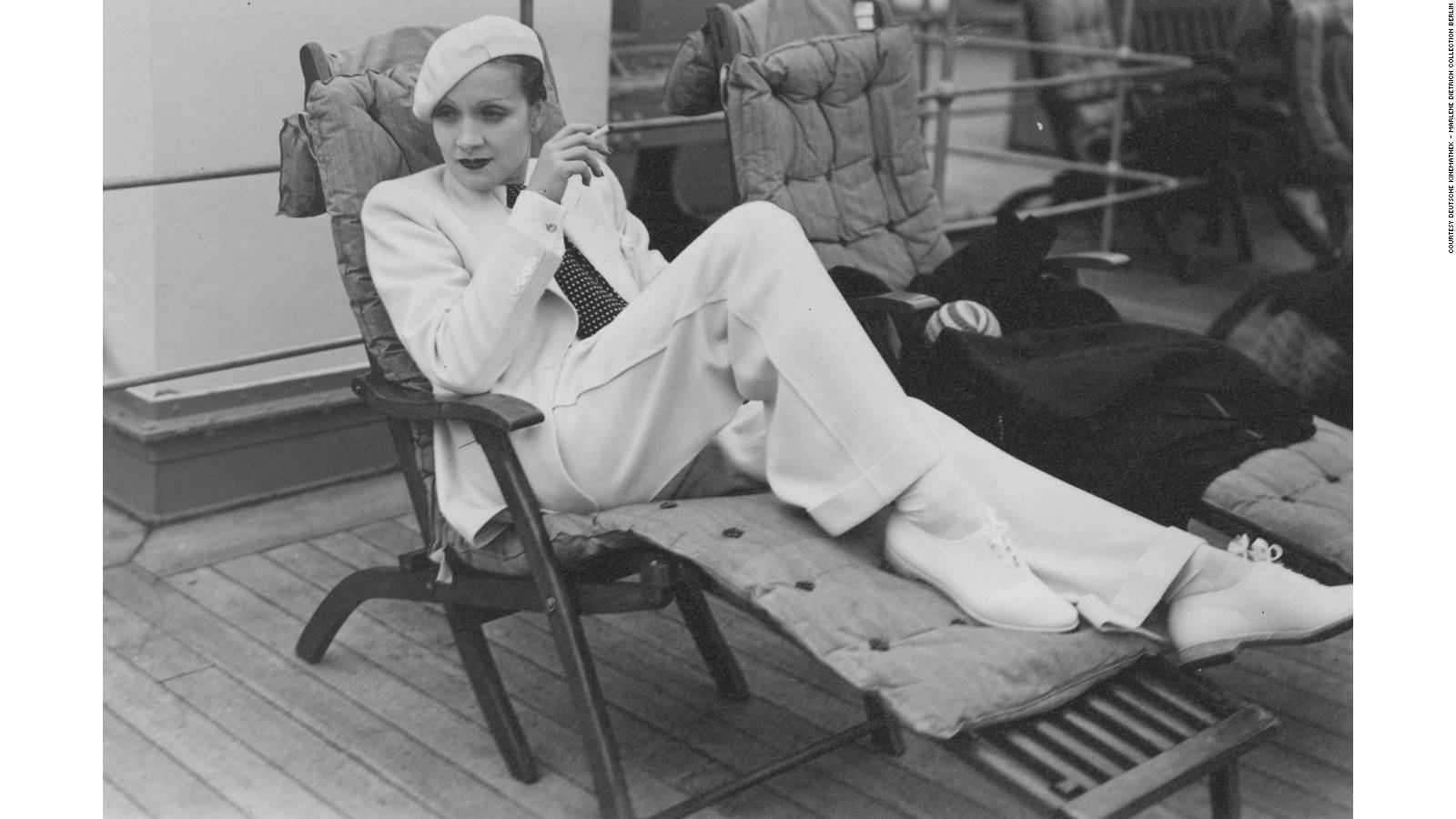 Marlene Dietrich On Beach Chair Wallpaper