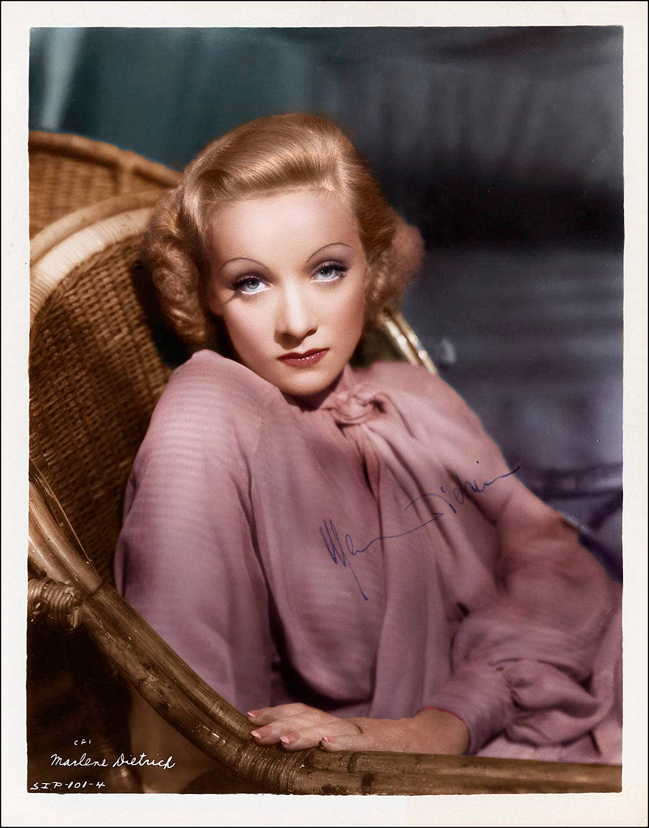 Marlene Dietrich On Rattan Chair Colored Wallpaper