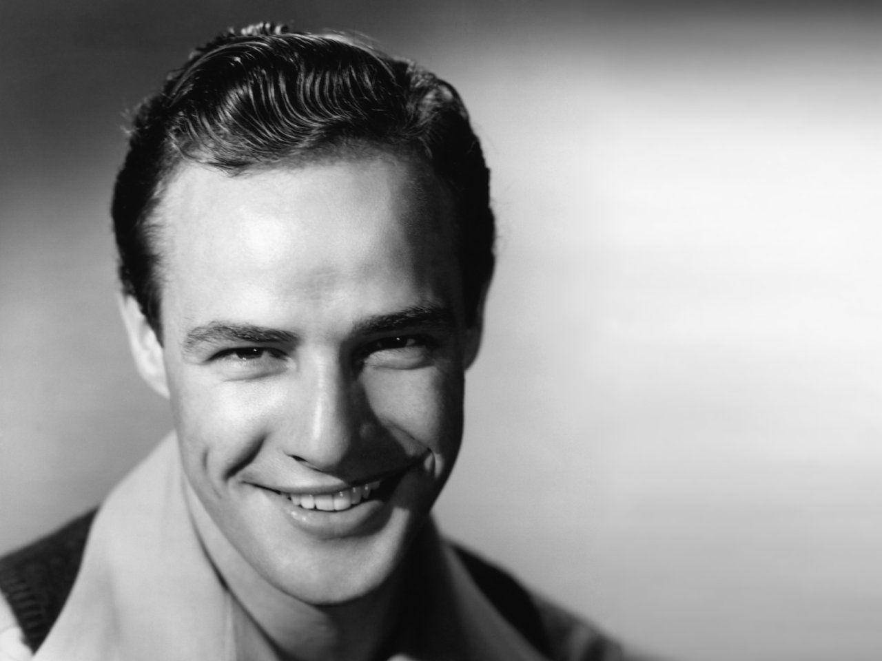 Marlon Brando Charming Smile With Dimples Wallpaper