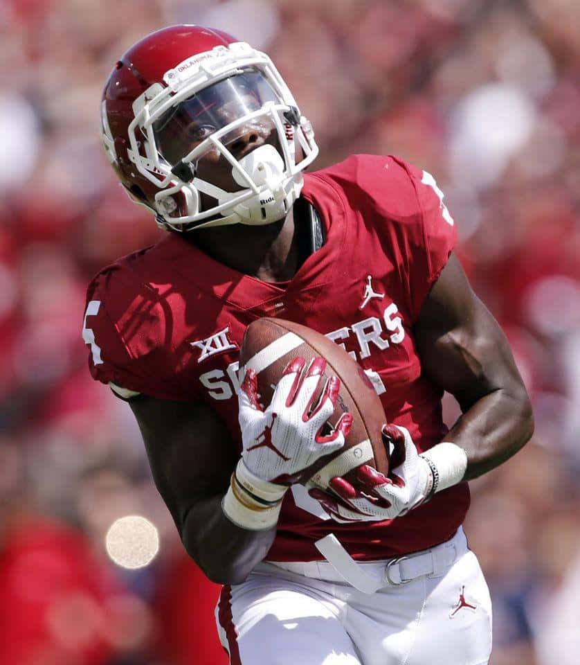 Marquise Brown Football Action Wallpaper