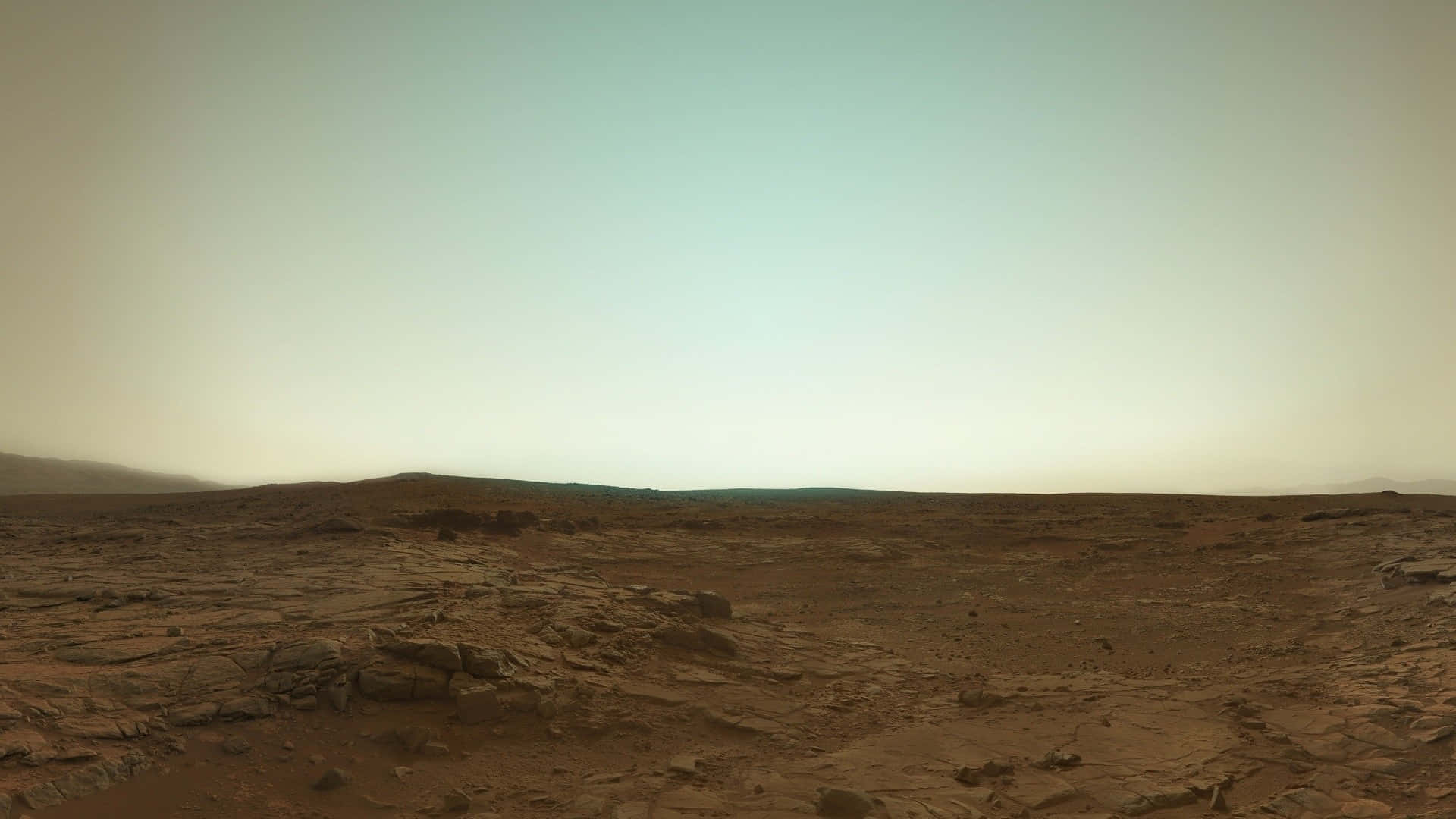 The surface of Mars, with its orange and ochre-coloured landscape