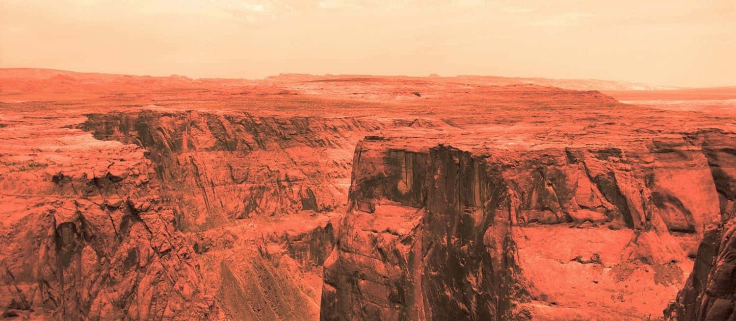 A panoramic view of Mars' fascinating landscape Wallpaper