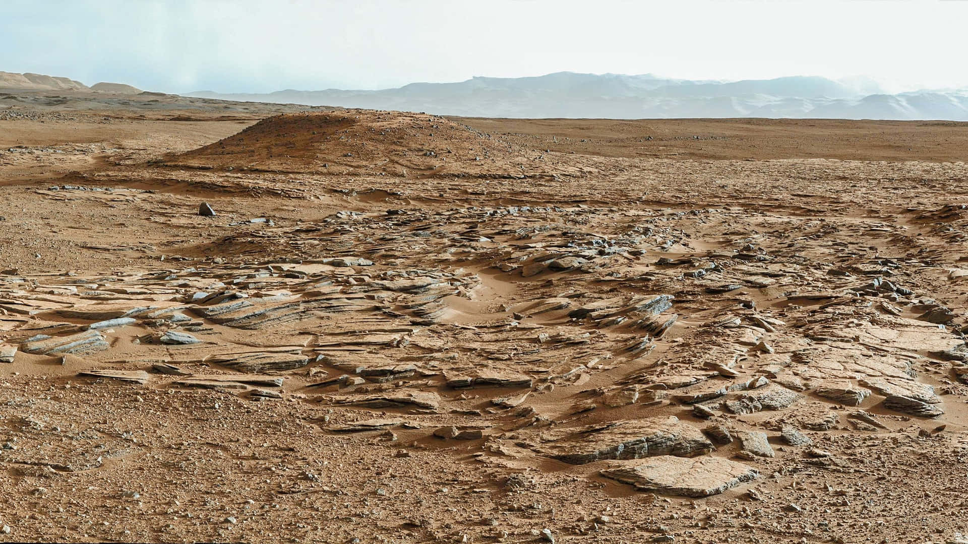 Stunning Mars Landscape with a rocky terrain Wallpaper