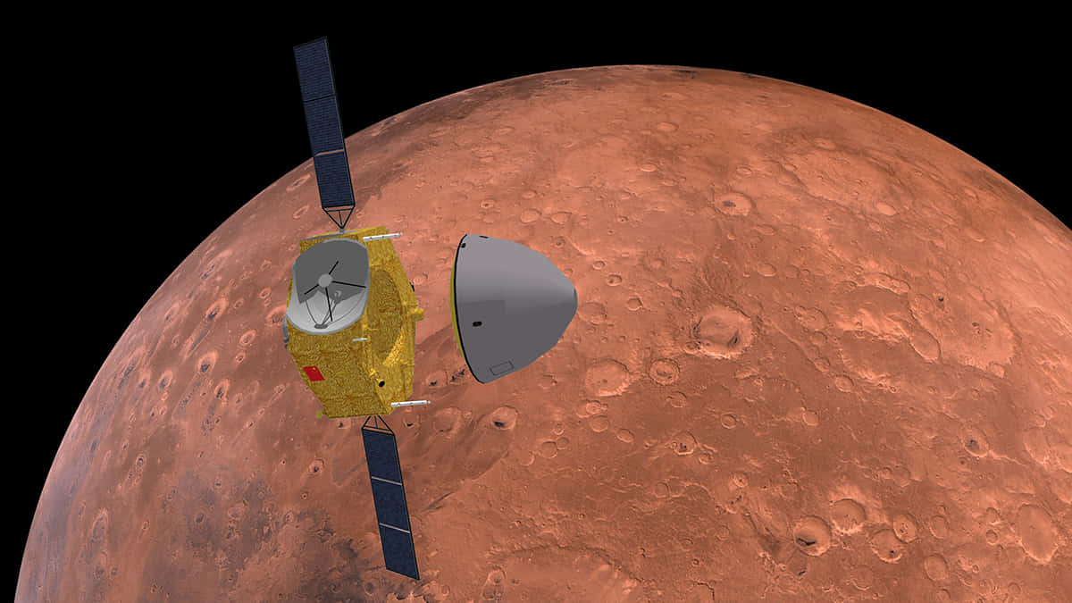 A Spacecraft Is Flying Over Mars