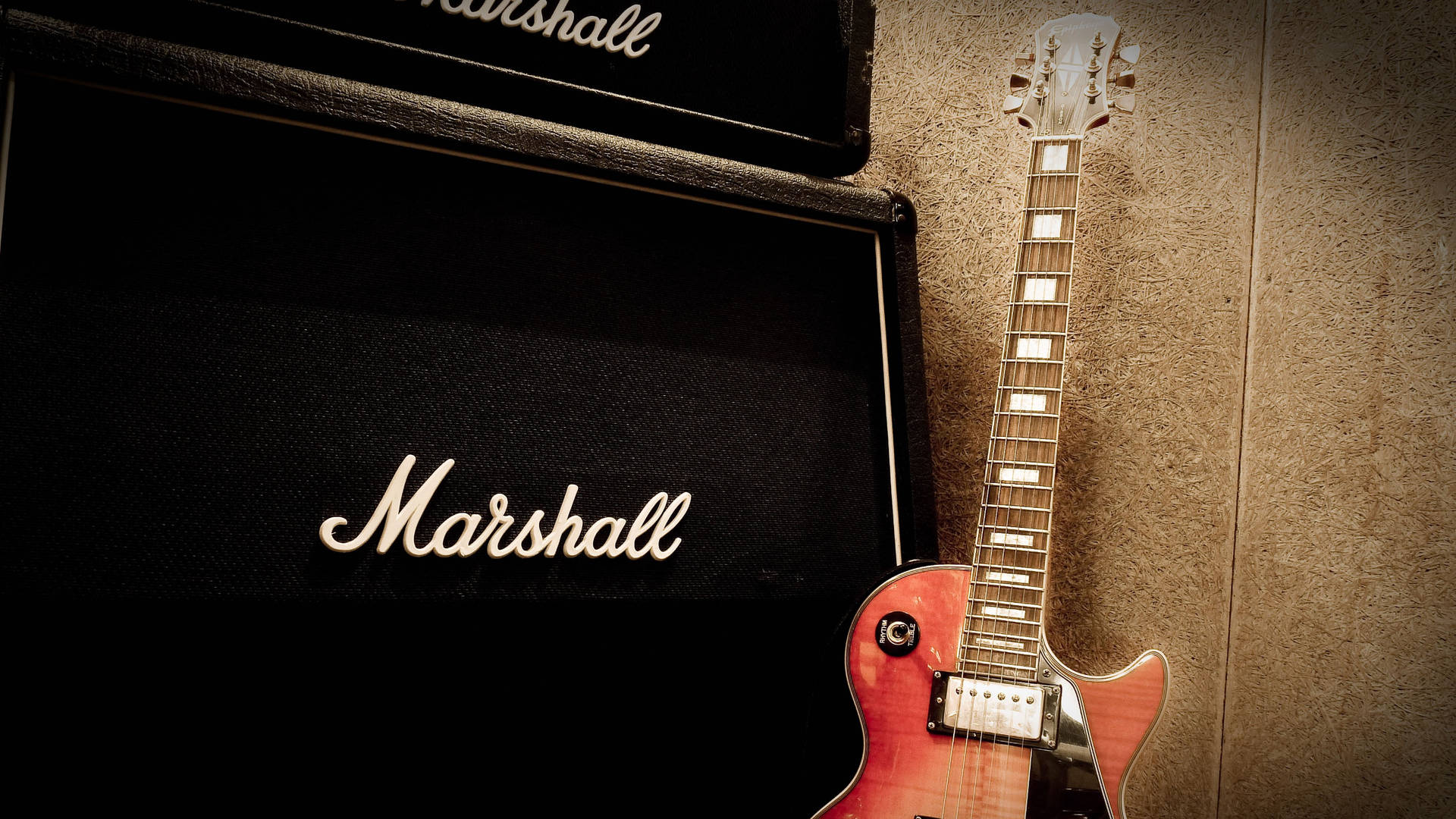 Marshall Amplifier With Gibson Guitar Background