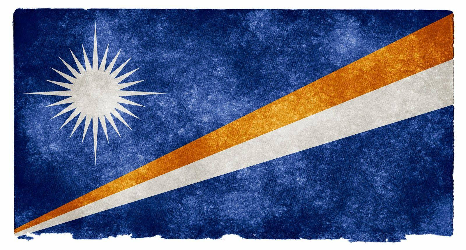 Caption: Strong Pride of the Marshall Islands - A Tattered Flag Wallpaper