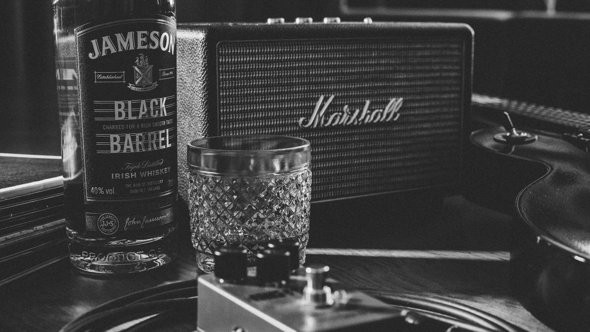 Marshall Speaker With Jameson Whiskey Background