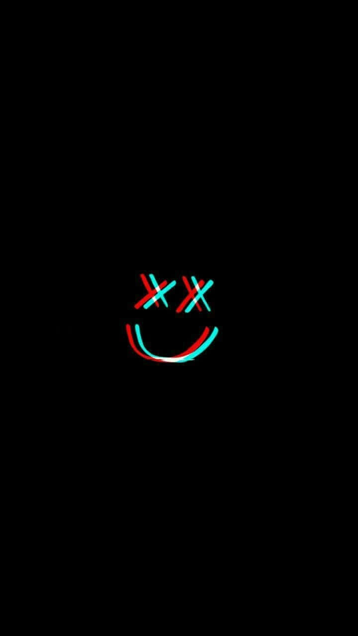 A Black Background With A Smiling Face On It Wallpaper