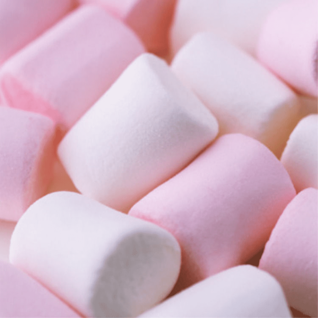 A Close Up Of Pink And White Marshmallows