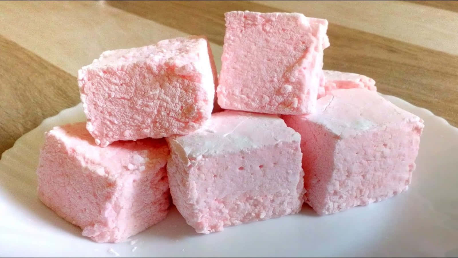 A Plate With Pink Marshmallows On It