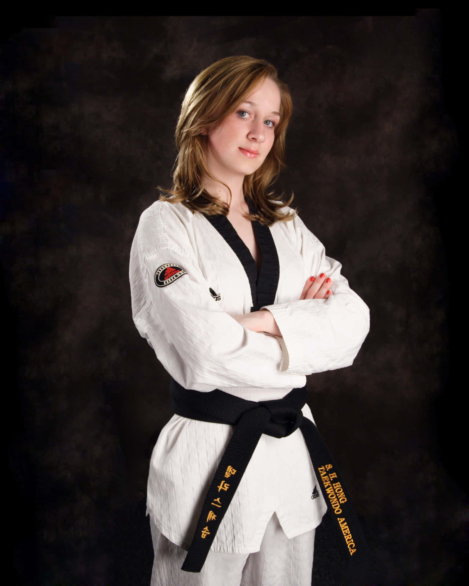 Karate student wearing traditional martial arts uniform Wallpaper