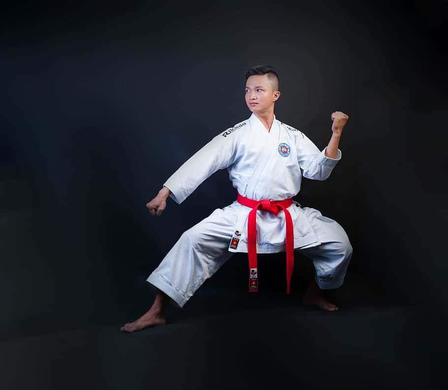 Young Martial Artists Wearing Traditional Uniforms Wallpaper