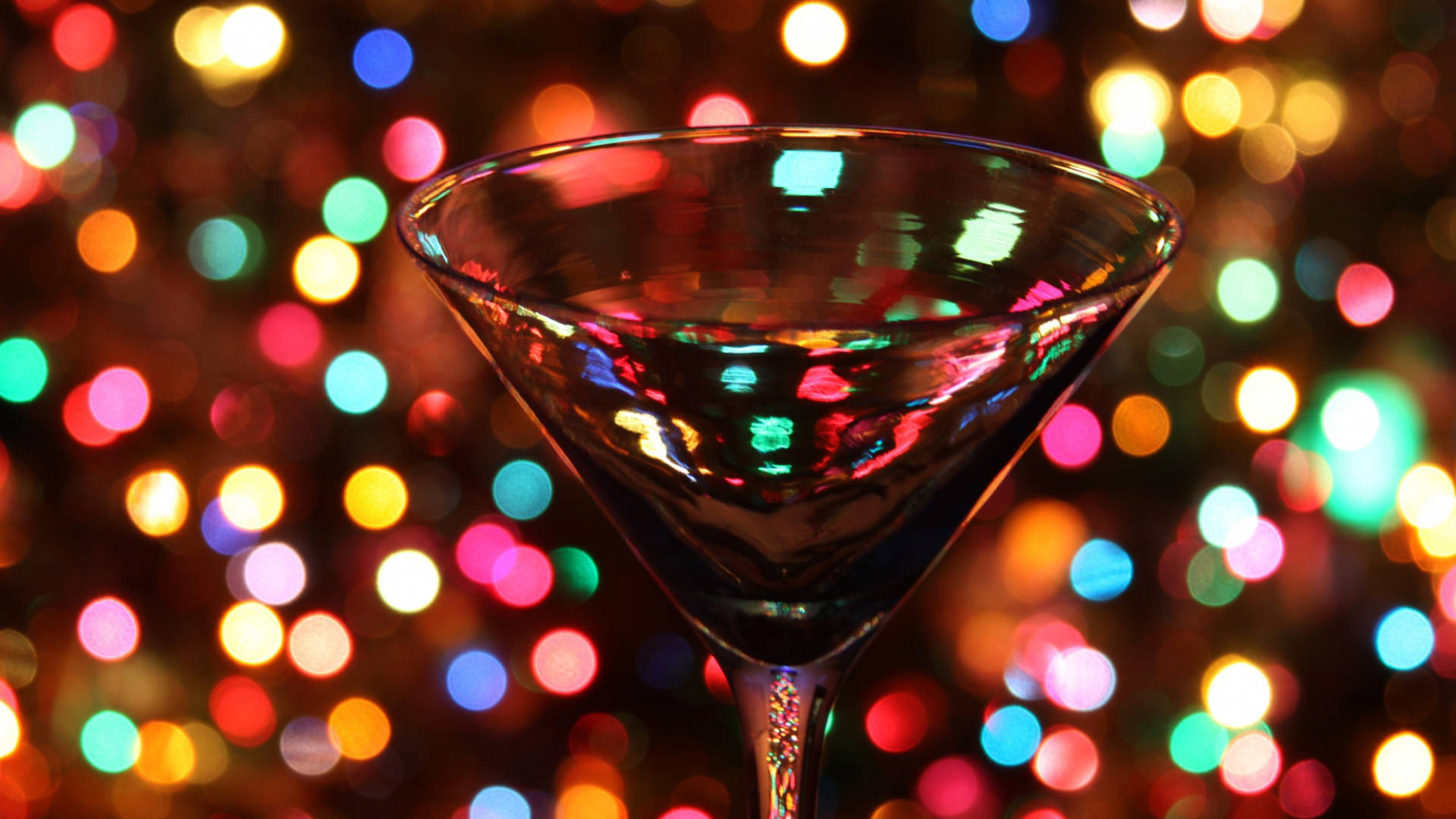 "A Radiant Martini Glass Glowing in the Darkness" Wallpaper