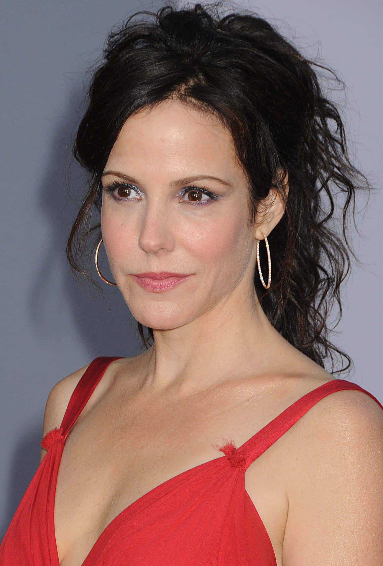 Mary Louise Parker on Red Staircase Wallpaper