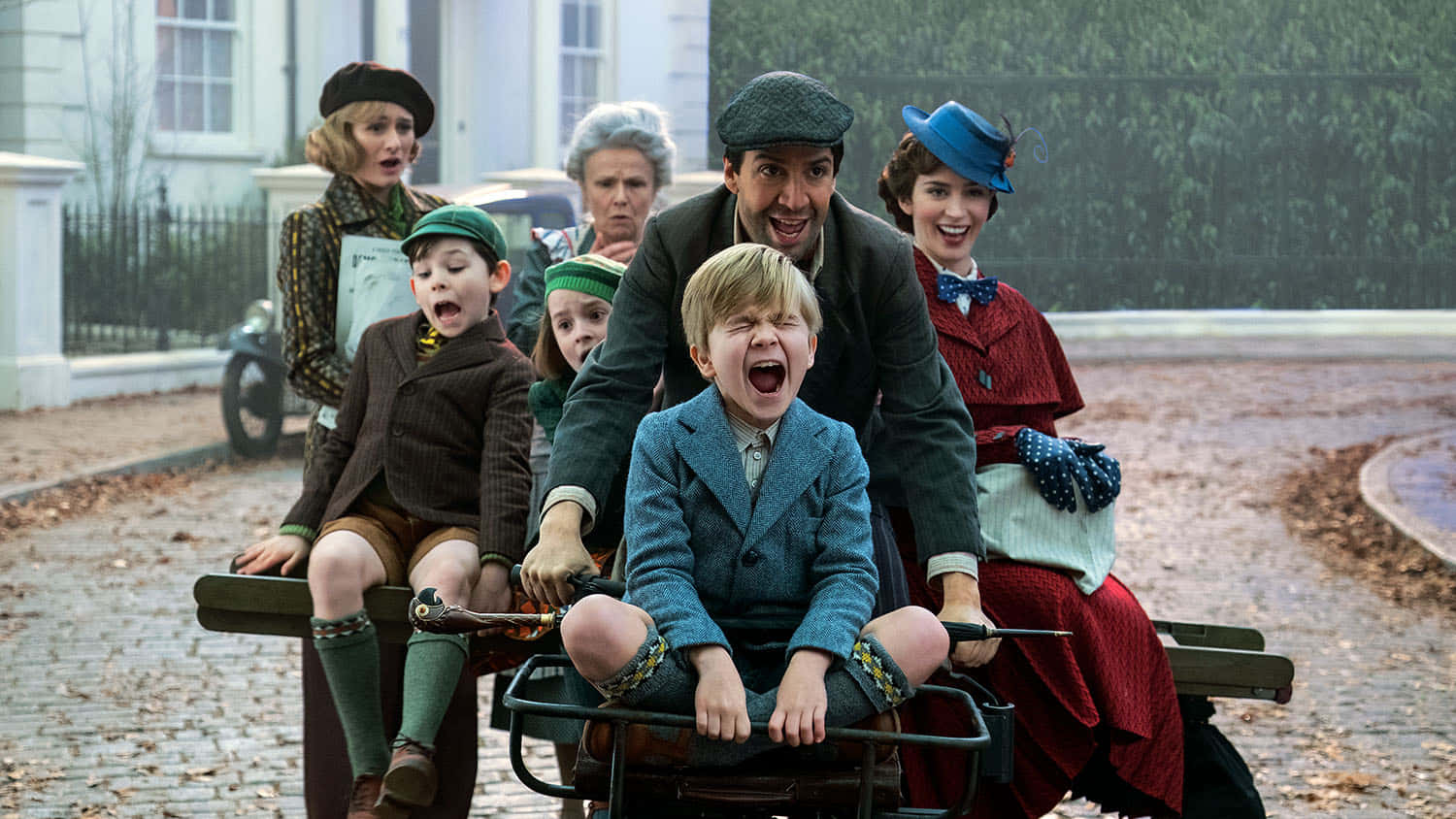 Download Mary Poppins Returns Joyful Bike Ride Wallpaper | Wallpapers.com