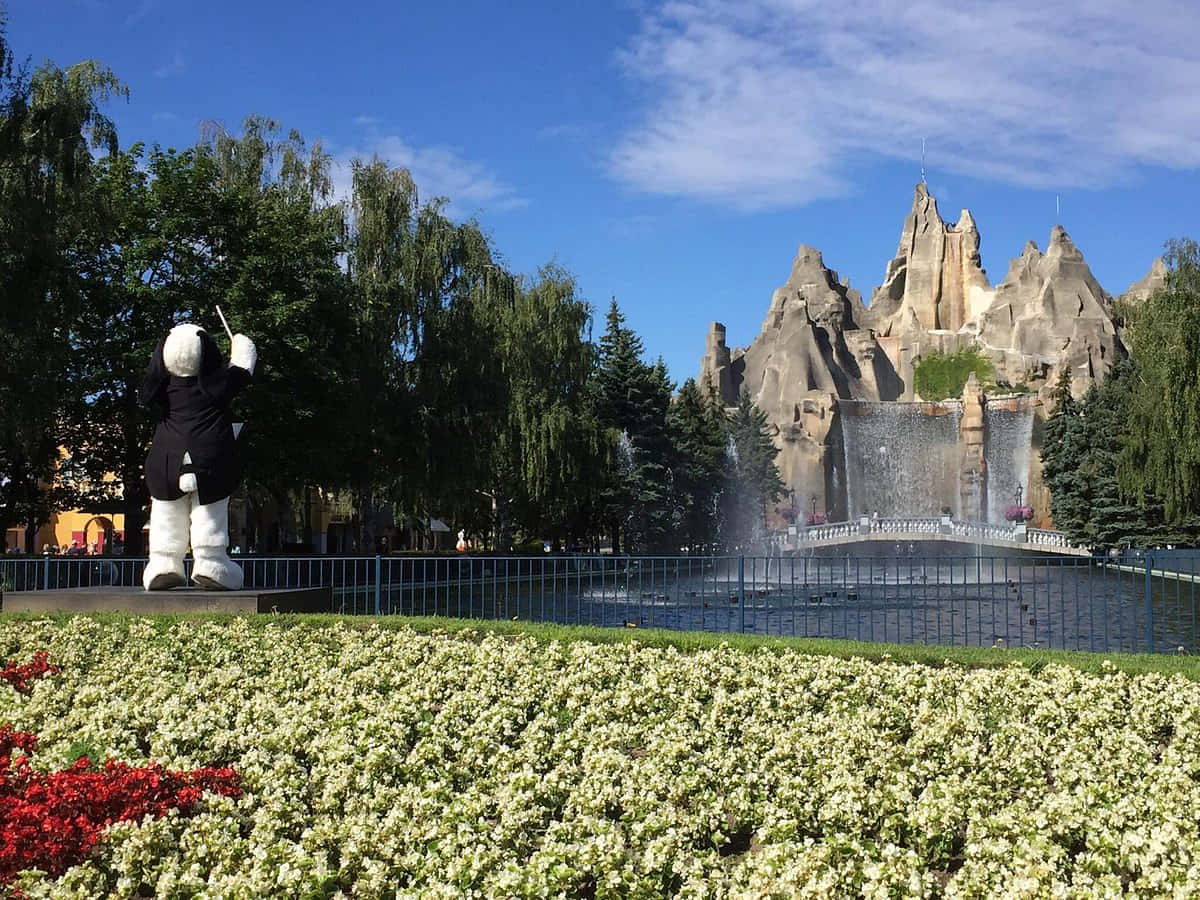 Maskot Hilsen Ved Wonderland Park Bakgrunnsbildet